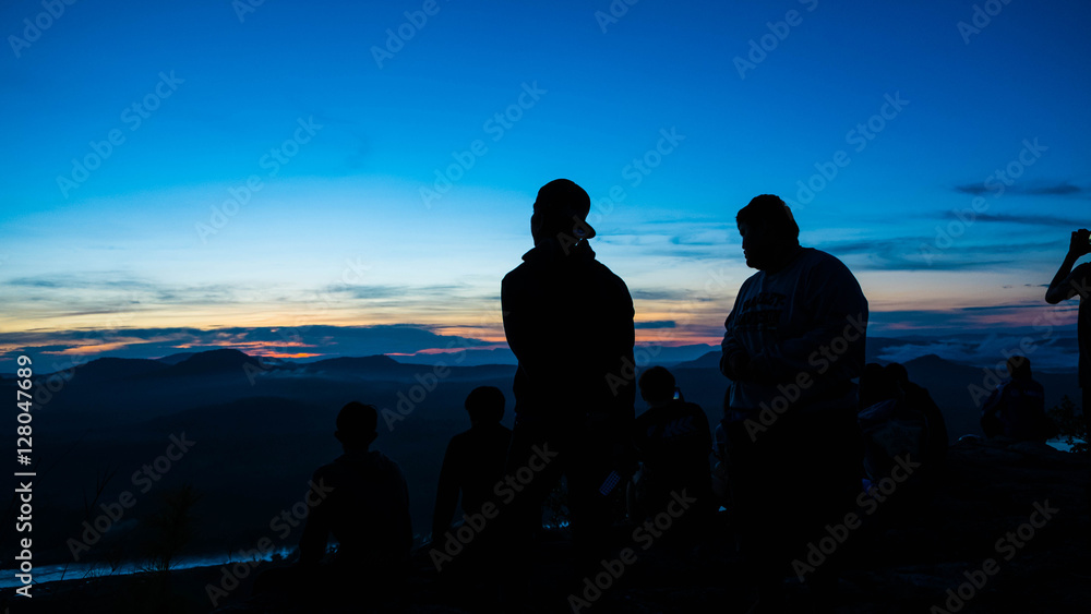 People silhouette in the early morning on mountain