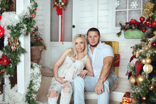 pregnant woman with her husband in New Year