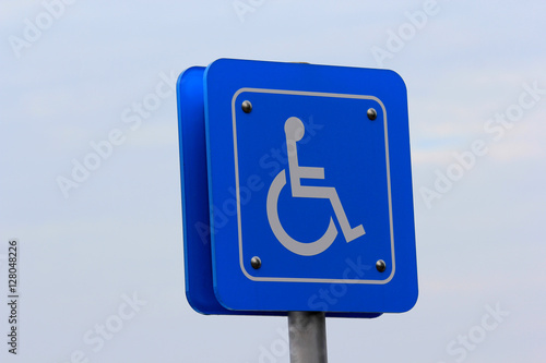 Handicapped parking symbol in car prak