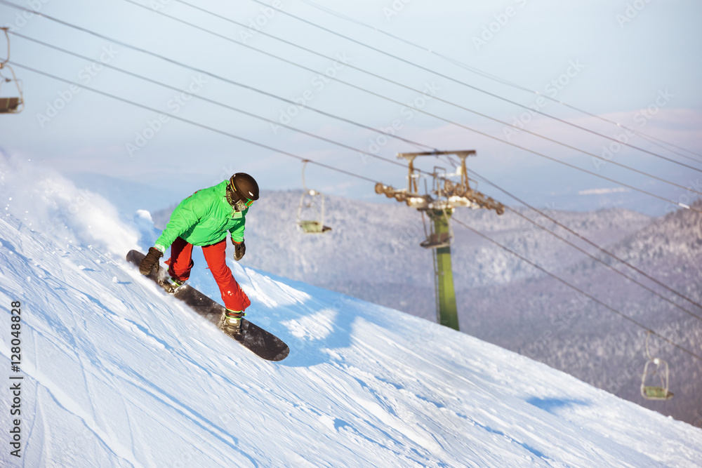 Snowboarder snowboarding riding downhill sheregesh Snowboarder snowboarding riding downhill sheregesh