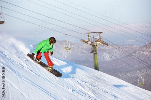 Snowboarder snowboarding riding downhill sheregesh