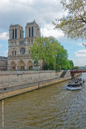 Dame de Paris Cathedral boat and Seine River embankment