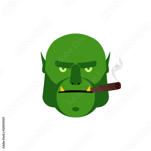 Angry ogr with cigar. Aggressive green monster isolated