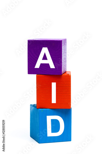 wooden toy cubes with letters. Aid