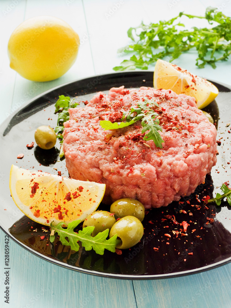 Beef tartar with spices StockFoto Adobe Stock