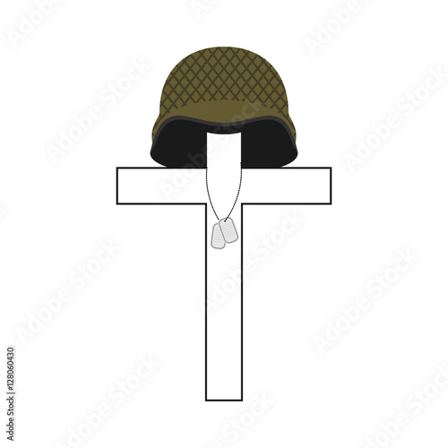 Grave of soldier. Cross and military helmet. Soldier badge. Patr photo