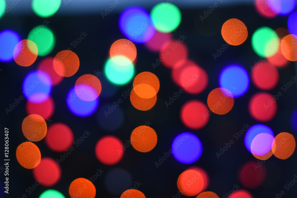 Colorful Star bokeh blurred abstract background. Christmas and new year party concept.