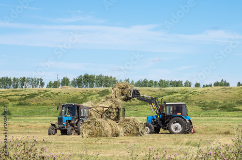 Loading hay front loader