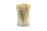 Closeup group of wooden toothpicks in the box isolated on white background.