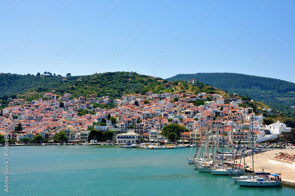 Naklejka premium Skopelos island, Sporades, Greece – June 25, 2016: View of Skopelos from sea
