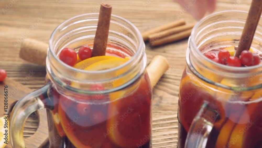 Homemade mulled wine with orange slices, cranberries, cinnamon . Homemade mulled wine with orange slices, cranberries, cinnamon .