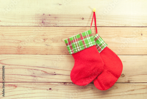Christmas sock on wooden background