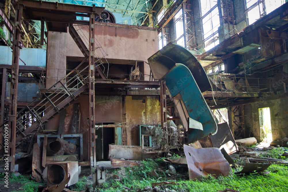 Abandoned, destroyed by war and overgrown machinery of Tkvarcheli power plant 