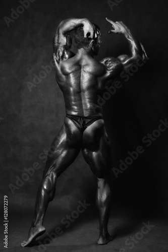 Beautiful muscular man's back in the studio © kanzefar