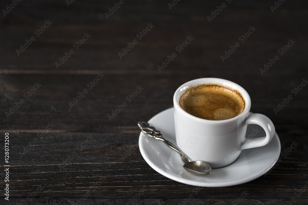 cup of aroma black espresso on wooden table cup of aroma black espresso on wooden table