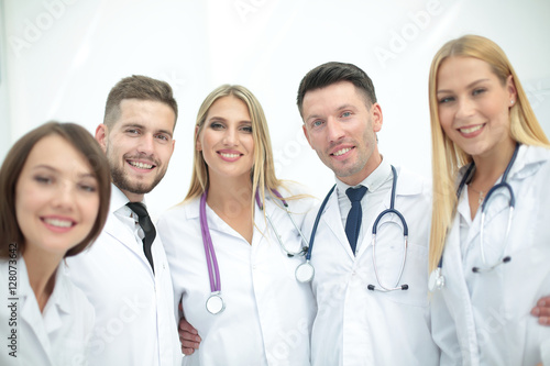 Smiling Team Of Doctors At Hospital Making Selfie