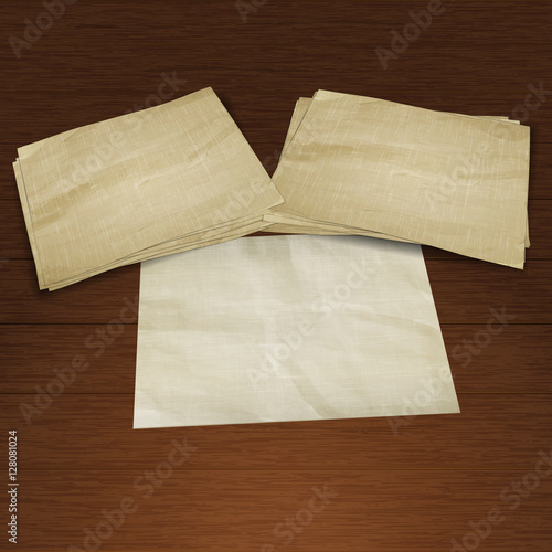 Background pile of clean old paper on a wooden board. There is a place to put your text or image.