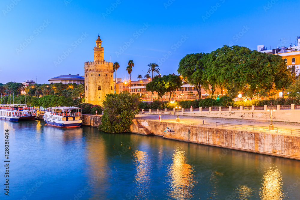 Seville, Spain. Guadalquivir river and Golden Tower (Torre del Oro)
