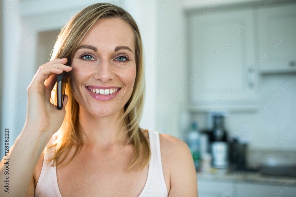 Fototapeta premium Pretty blonde woman on the phone