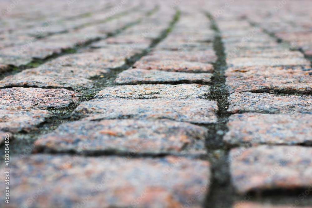 Pavement made of red granite. Closeup Pavement made of red granite. Closeup