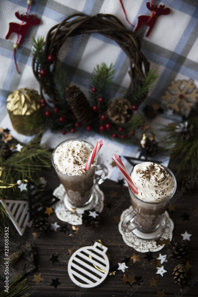wait for Christmas drinking cocoa with whipped cream