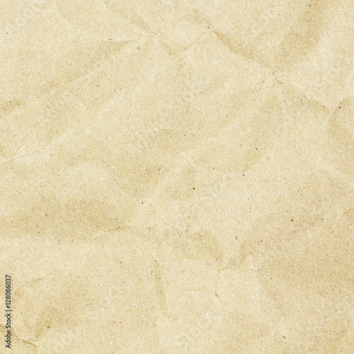 Recycled crumpled brown paper texture or paper background for design with copy space for text or image.