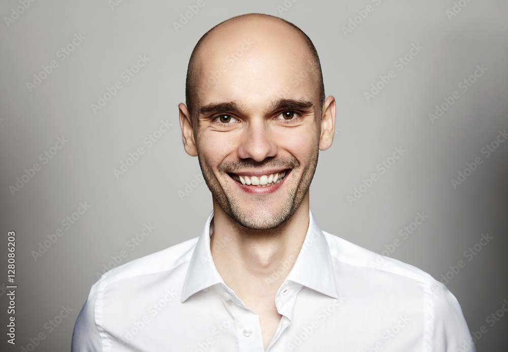 Obraz premium Smiling Man in White Shirt