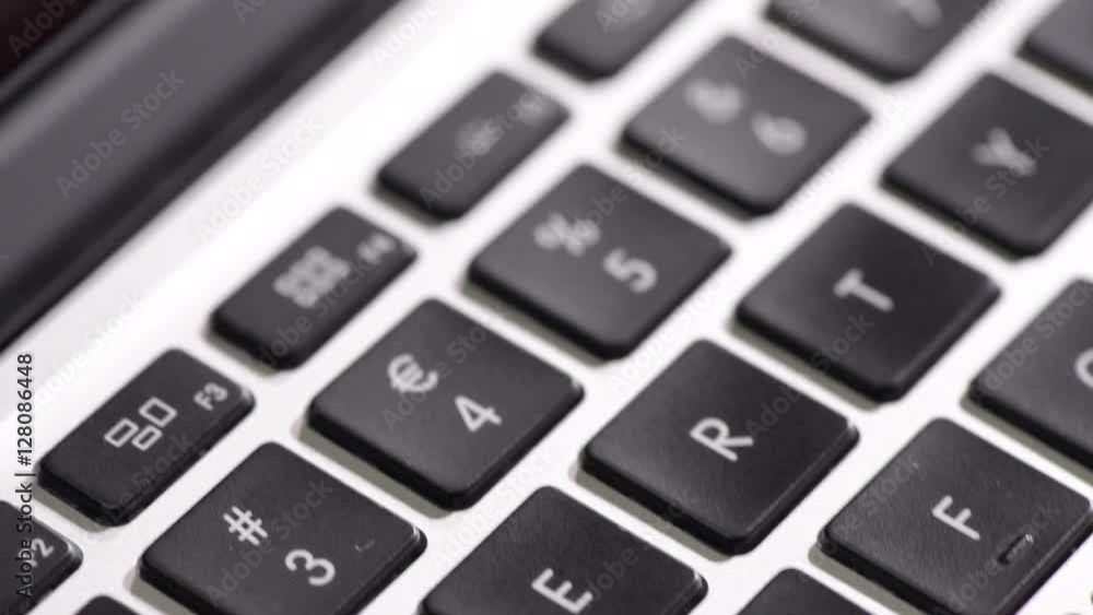 Computer keyboard in close up. Film clip with sliding motion of office work and communication technology. Computer keyboard in close up. Film clip with sliding motion of office work and communication technology.