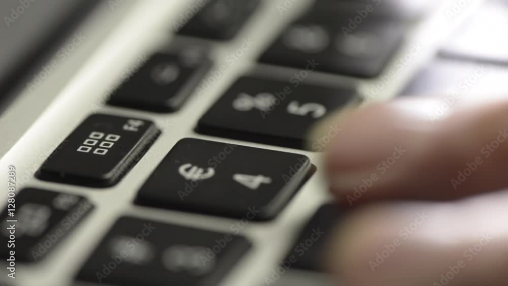 Hands typing on computer keyboard in close up. Film clip with sliding motion of office work and communication technology. Hands typing on computer keyboard in close up. Film clip with sliding motion of office work and communication technology.