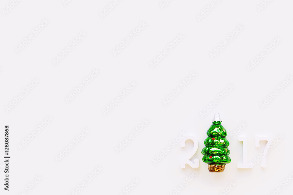 Christmas background with New Year symbol - decorative fir tree. Place for text. Flat lay, top view.