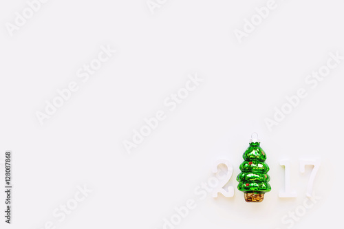 Christmas background with New Year symbol - decorative fir tree. Place for text. Flat lay  top view.