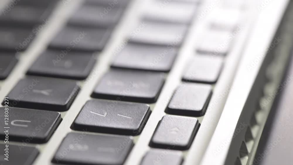 Computer keyboard in close up. Film clip with sliding motion of office work and communication technology. Computer keyboard in close up. Film clip with sliding motion of office work and communication technology.