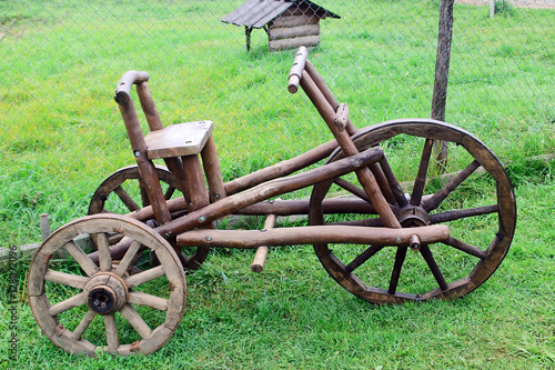 Three-wheeled wooden scooter photo