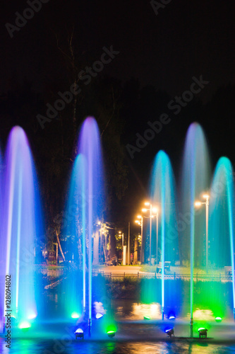fountain with colored backlight in park