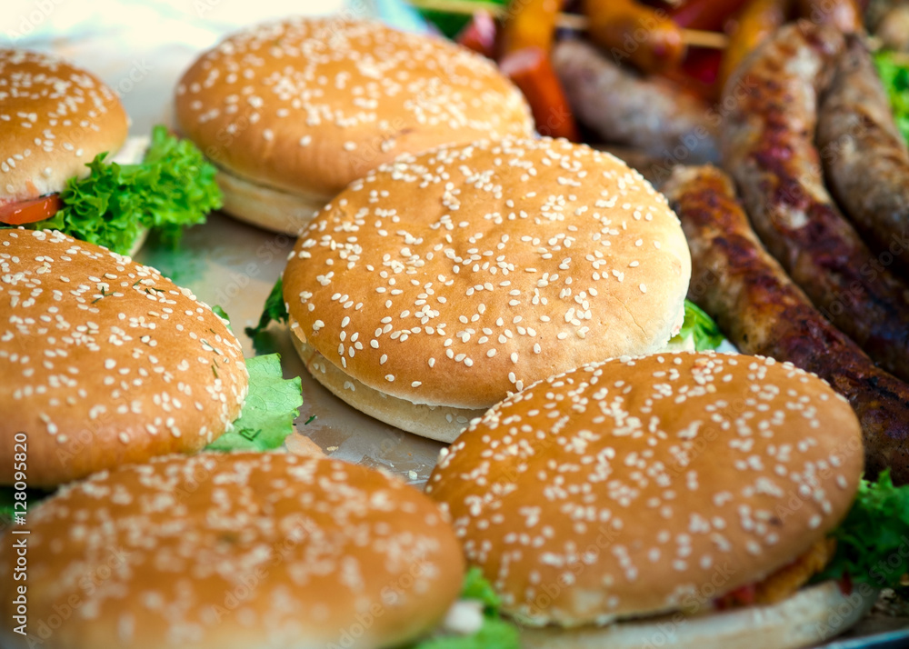 Hamburgers with salad and meat, street food. Selective focus Hamburgers with salad and meat, street food. Selective focus