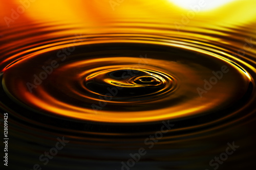 Water ripples on nice orange background