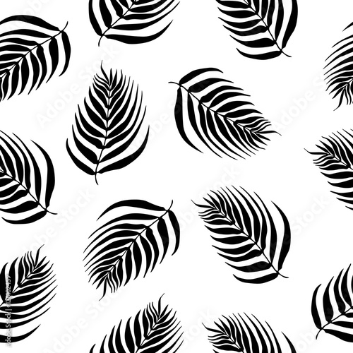 endless pattern of black and white palm leaves