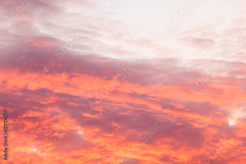 Colorful warm clouds on sky at sunset © Voyagerix