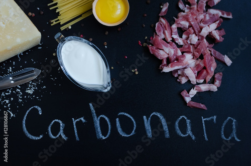 Ingredients for Pasta Carbonara on dark background
