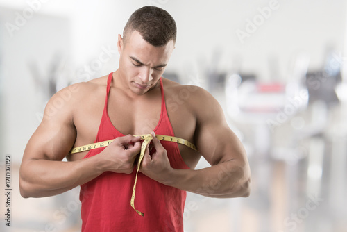 Man Measuring His Chest