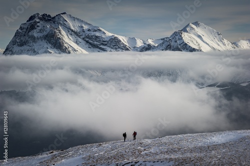 Snow capped mountains covered with clouds, Abruzzo, Italy  photo
