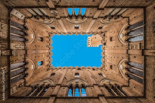 Torre del Mangia seen from below, Siena, Tuscany, Italy  photo