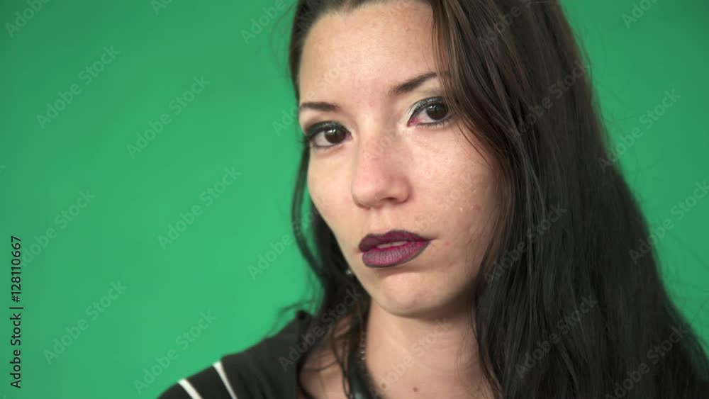 Cuban people and emotions, portrait of sad latina girl looking at camera. Depressed hispanic young woman from Havana, Cuba. Close-up of face Cuban people and emotions, portrait of sad latina girl looking at camera. Depressed hispanic young woman from Havana, Cuba. Close-up of face