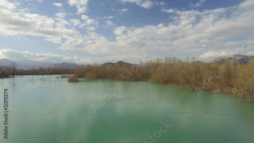 Aerial view of Moraca river which flows into beauty big Skadar lake photo