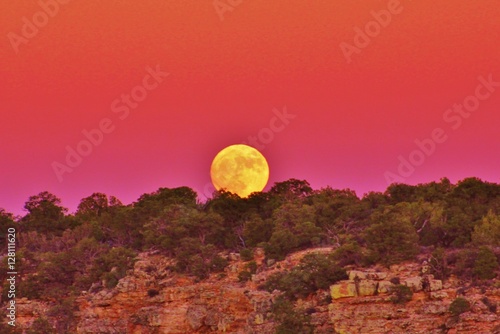 Amazing supermoon during sunset over the Grand Canyon, Arizona