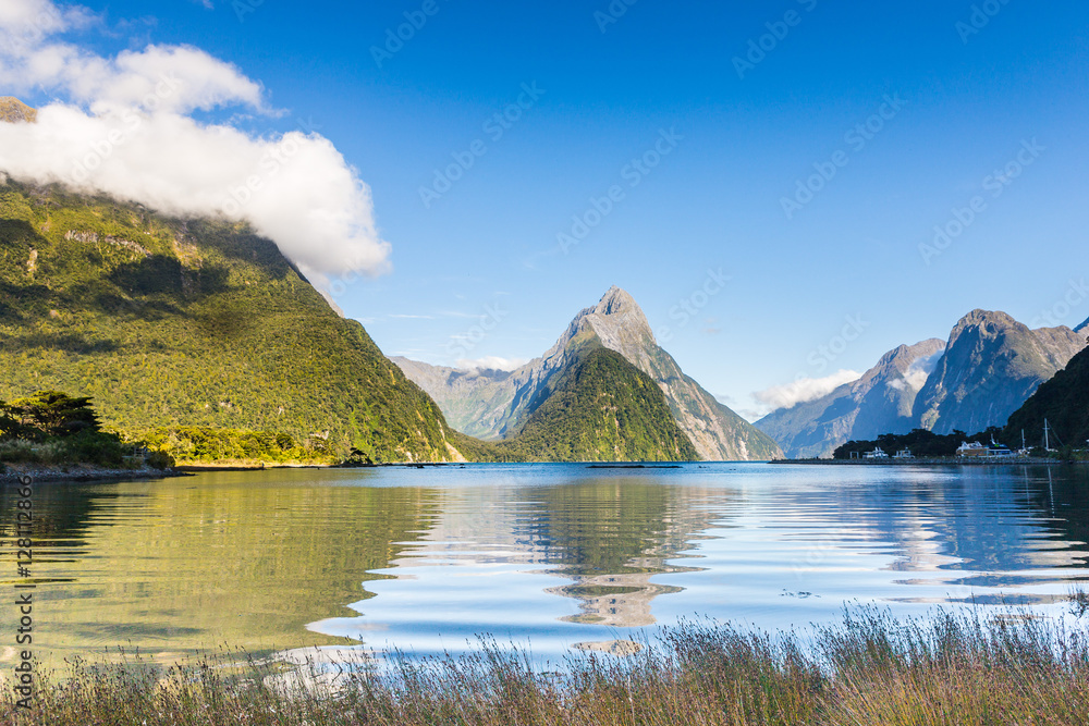 Morning view on Milford Sound and Mitre Peak over the calm water