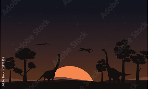 At sunset brachiosaurus landscape of silhouettes