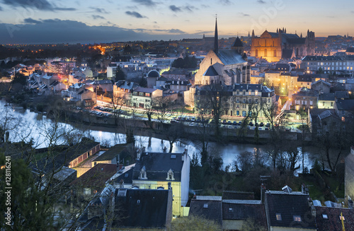 Night view of Poitiers and river Clain, Poitou-Charentes, France  photo