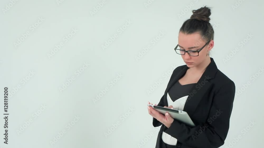 business woman with a tablet computer in her hands business woman with a tablet computer in her hands