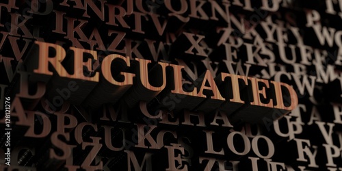 Regulated - Wooden 3D rendered letters/message. Can be used for an online banner ad or a print postcard.